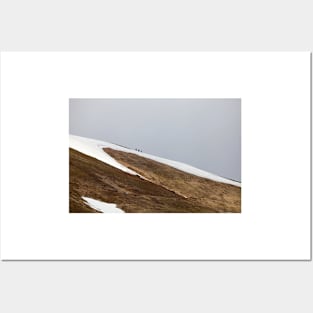 Three tourists walking at the mountains Posters and Art